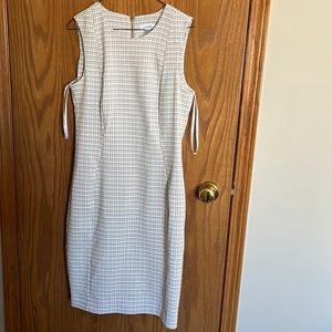 Calvin Klein back zip dress. Sleeveless. Size 10.  Beige and white/cream.